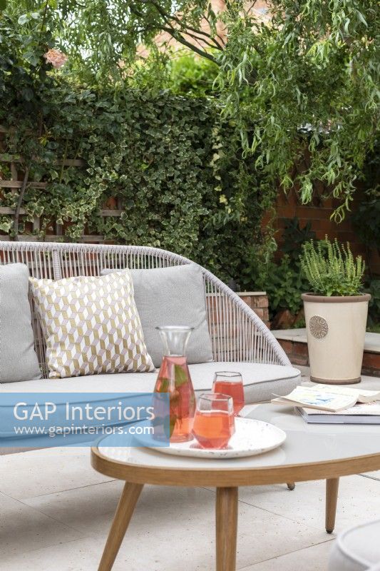 Contemporary patio furniture with summer drinks