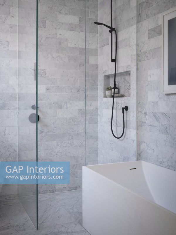 Minimal shower with grey tiling