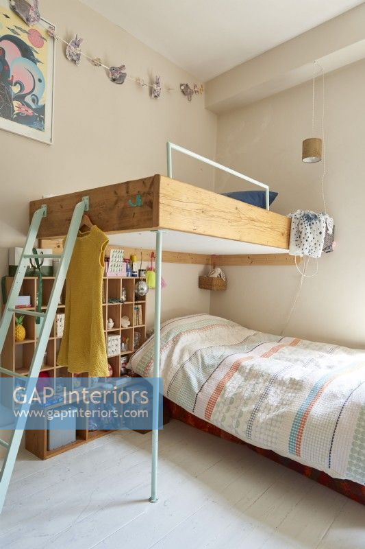 Corner view of children's bedroom with bunk beds 