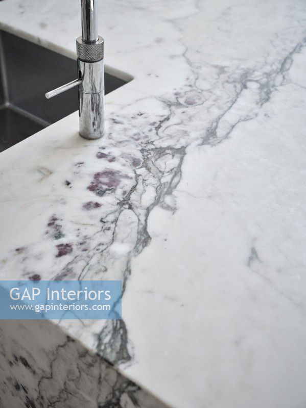 Elegant marble kitchen surface in grey and white