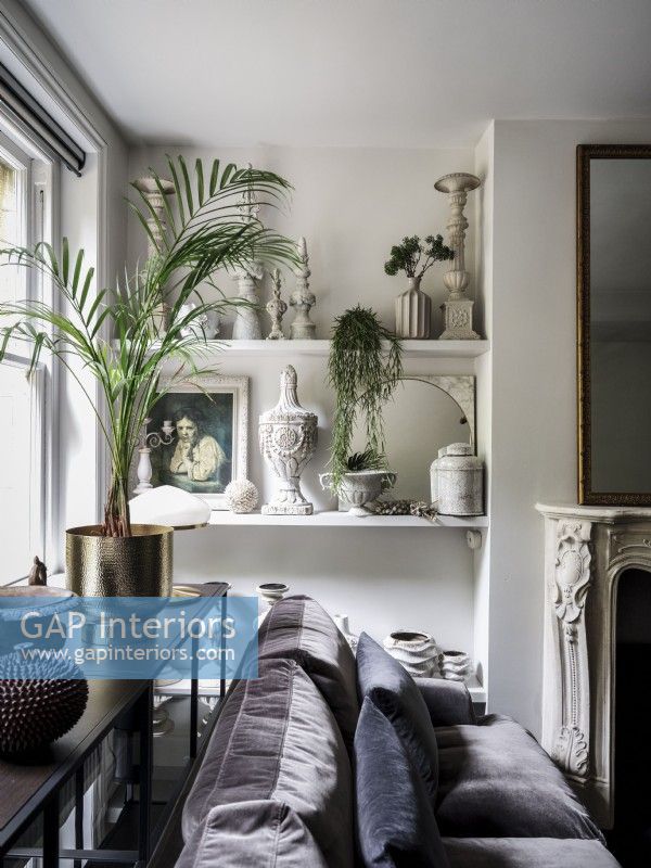 Display of ornaments and house plants in snug