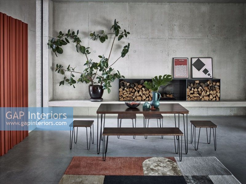 Dining table and stools in modern industrial room