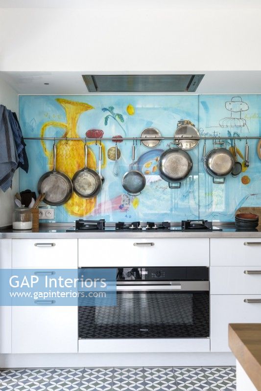 Colourful splashback feature wall in modern kitchen