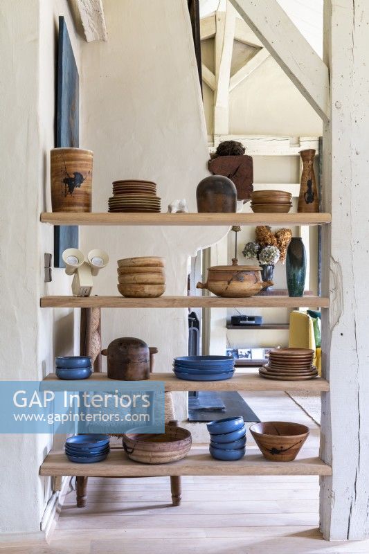 Rustic shelves with plates and bowls