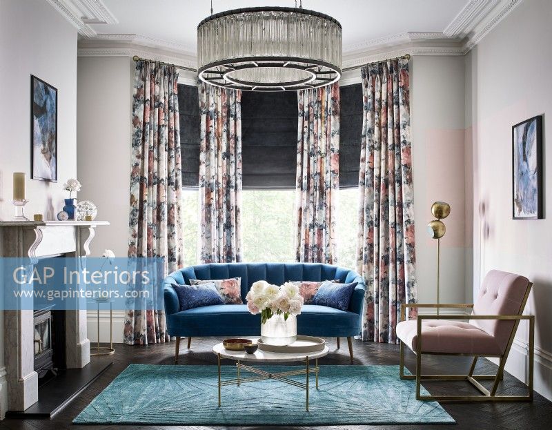 Living room with curtains and roman blinds