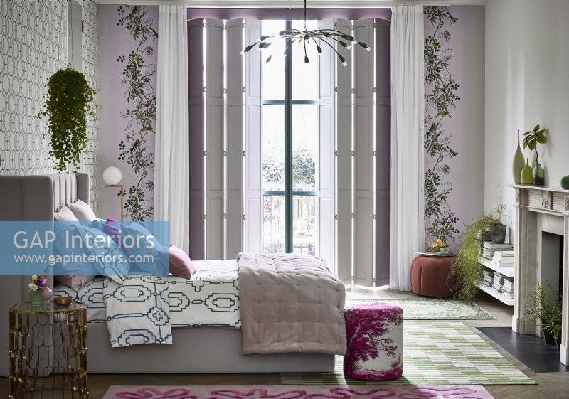 Bedroom with solid shutters