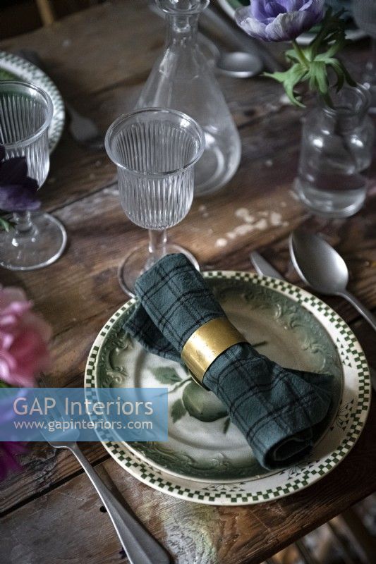 Gold napkin ring - detail of dining table 