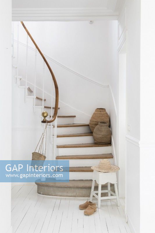 White painted country hallway and staircase