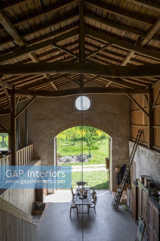 Overhead view of dining area in rustic barn home