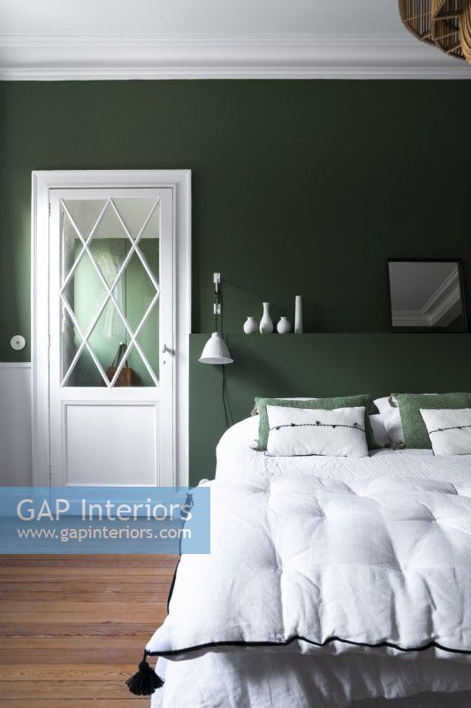 Modern green and white bedroom
