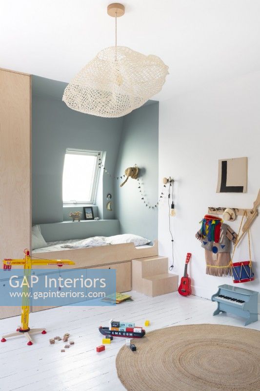 Modern childrens room with built-in alcove bed