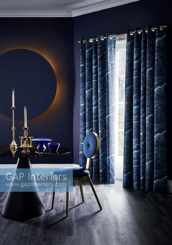 Dark blue contemporary dining room with curtains