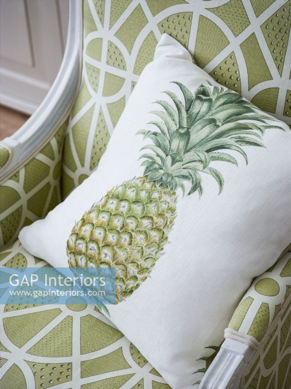Pineapple design cushion on classic chair