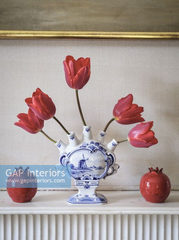 Blue and White vase with Red Tulips 
