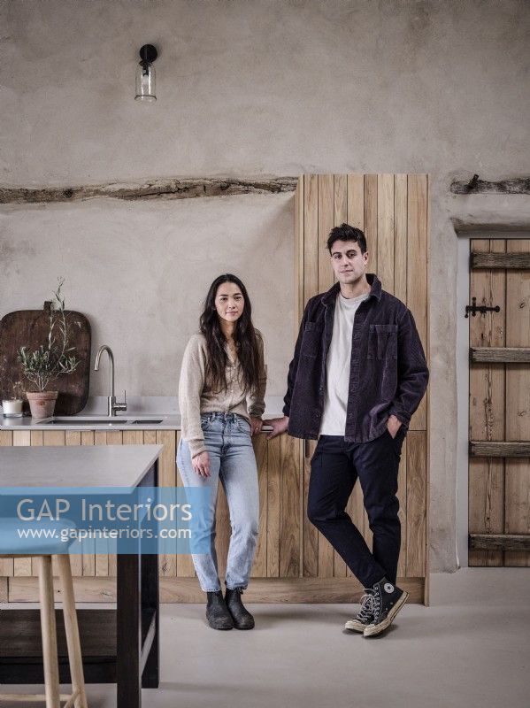 Portrait of homeowners Sophie and Rich Vermont in the Open plan Kitchen