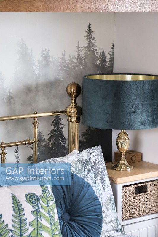 Dark blue velvet lamp on bedside table - bedroom furniture detail