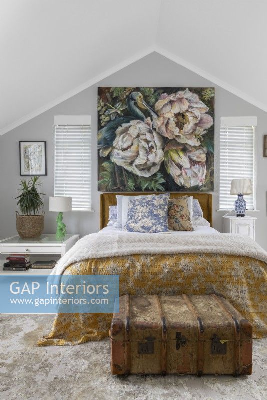 Bedroom with floral large painting