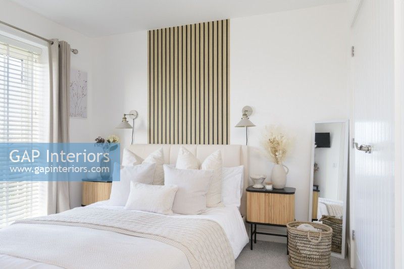 Modern bedroom with slatted wood effect wallpaper