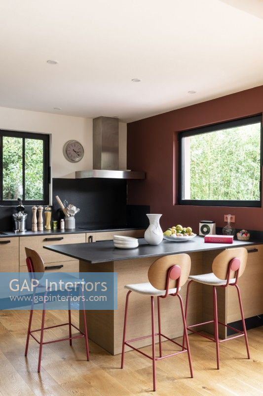 Contemporary red, black and wooden kitchen