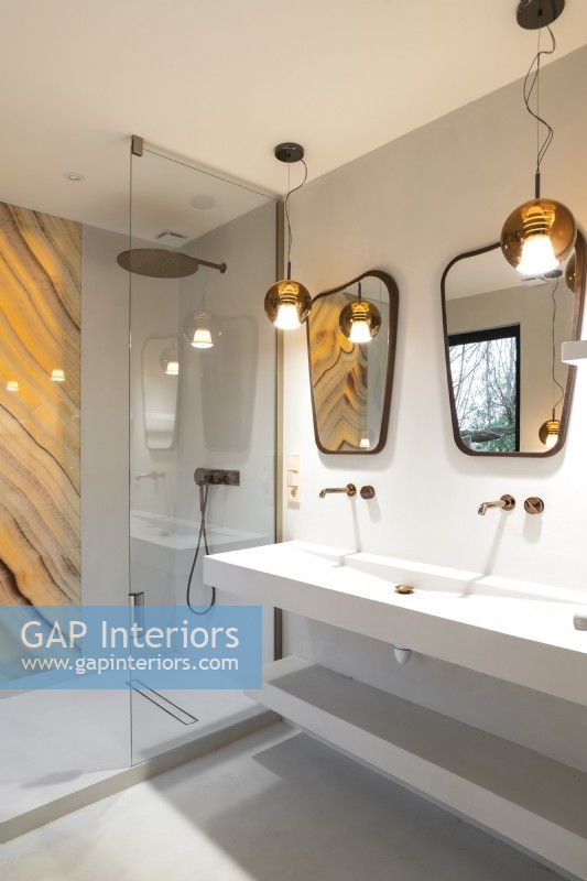 Double sink with mirrors in contemporary bathroom