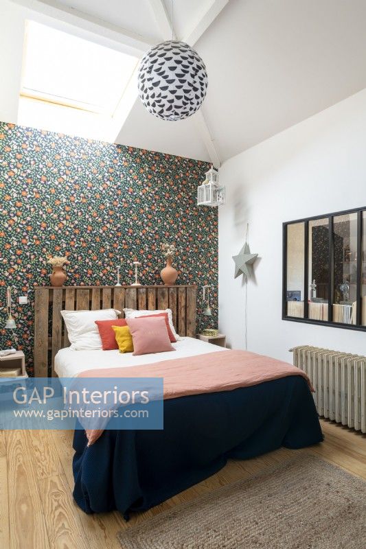 Floral wallpaper feature wall in modern bedroom