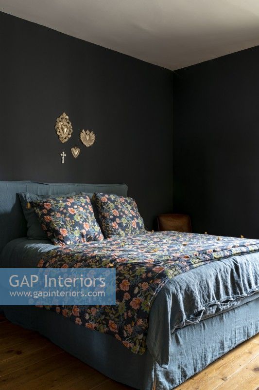 Dark grey bedroom with floral bedding 