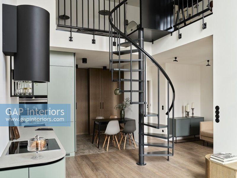Modern kitchen dining room spiral staircase and mezzanine