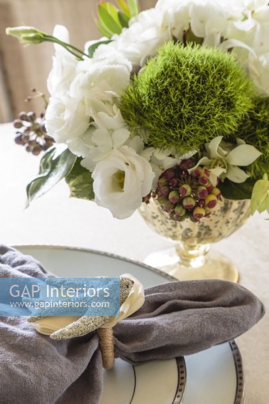 No starched napkins for this house; natural linen is more suited to the coupleâ€™s easy elegant style.