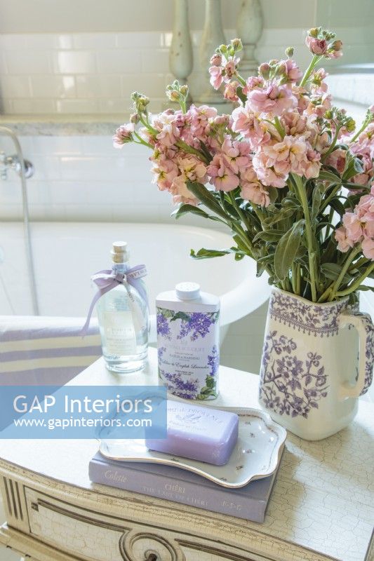  Lavender-scented French milled soap sits on a tiny hand-painted porcelain tray Anita found in France.