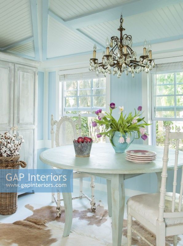 Beadboard brings a touch of farmhouse style to the  dining room.