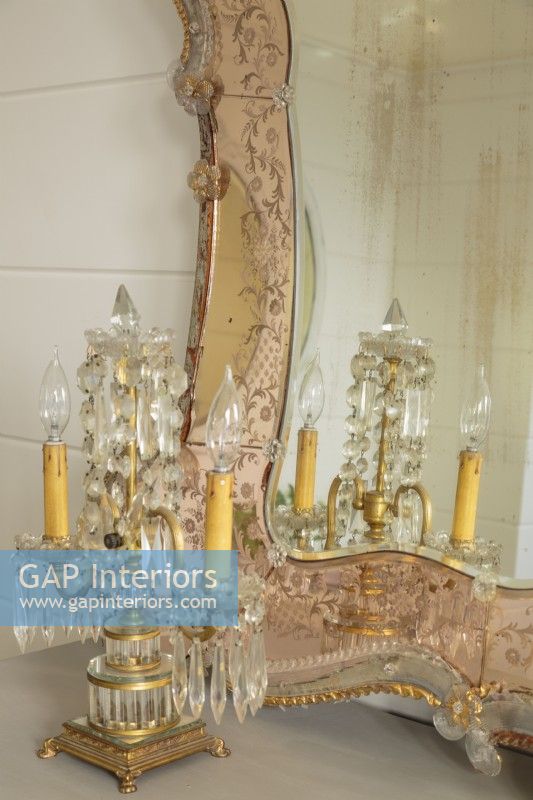  In Leah's home, authentic items, like this French girandole and Murano mirror, are valued over newly minted, store-bought items.