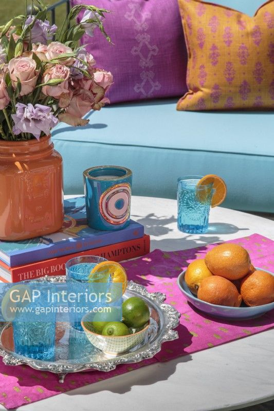 Jewel-toned serving ware borrows shades from nature to create an inviting tableau.