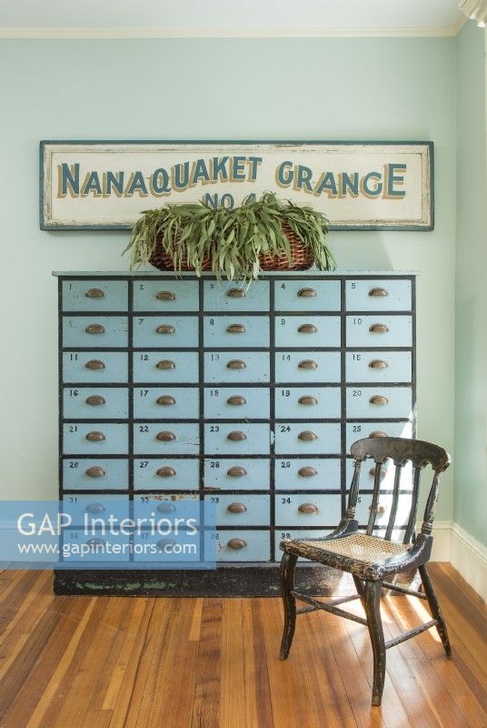 Rescued from an 1890s tool factory, this multi- drawer piece offers much needed storage.