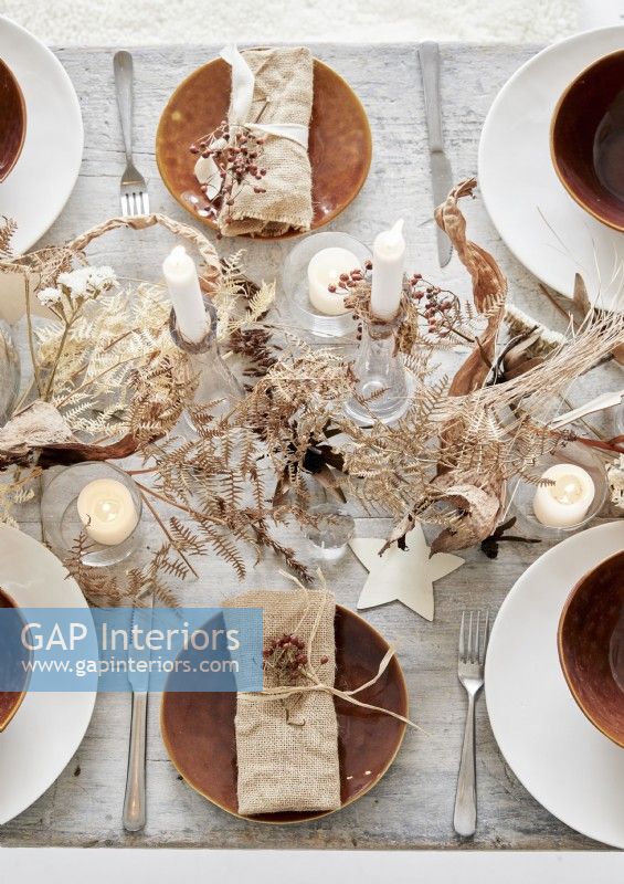 Detail of rustic Christmas dining table