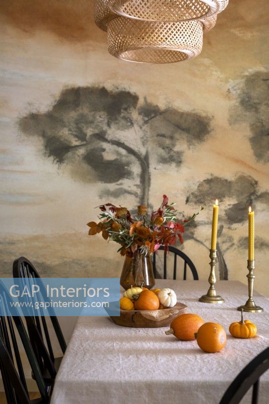 Autumnal display on vintage style dining table