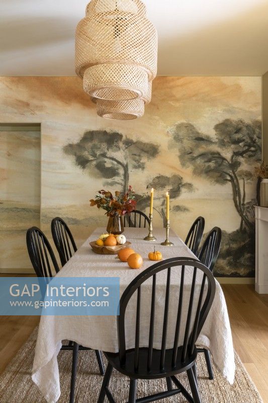 Mural painted feature wall in vintage style dining room