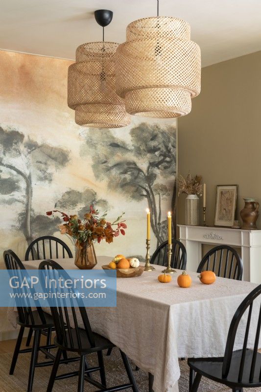 Painted mural feature wall in vintage style dining room