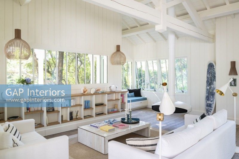White living room with inbuilt storage