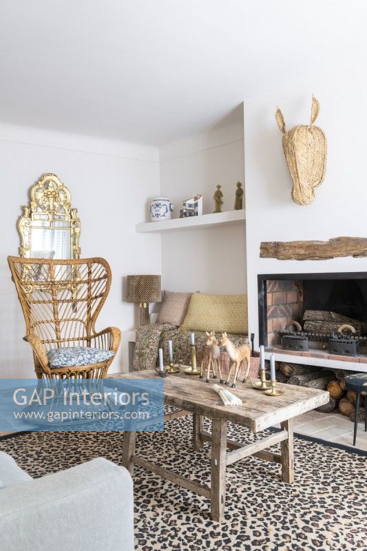Vintage wicker armchair in eclectic country living room