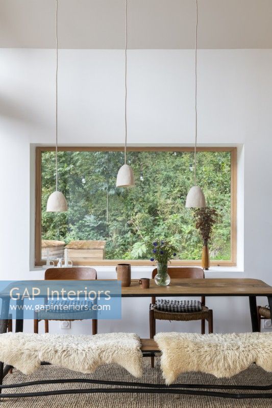 Modern dining room with large picture window