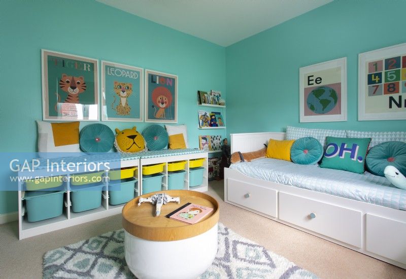 Daybed and storage drawers in colourful childrens room
