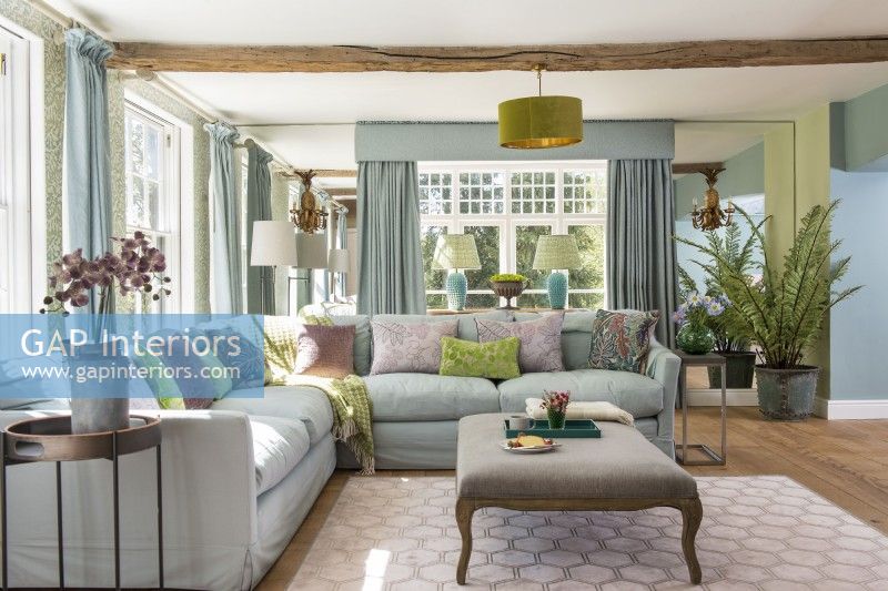 Large corner sofa in country living room 