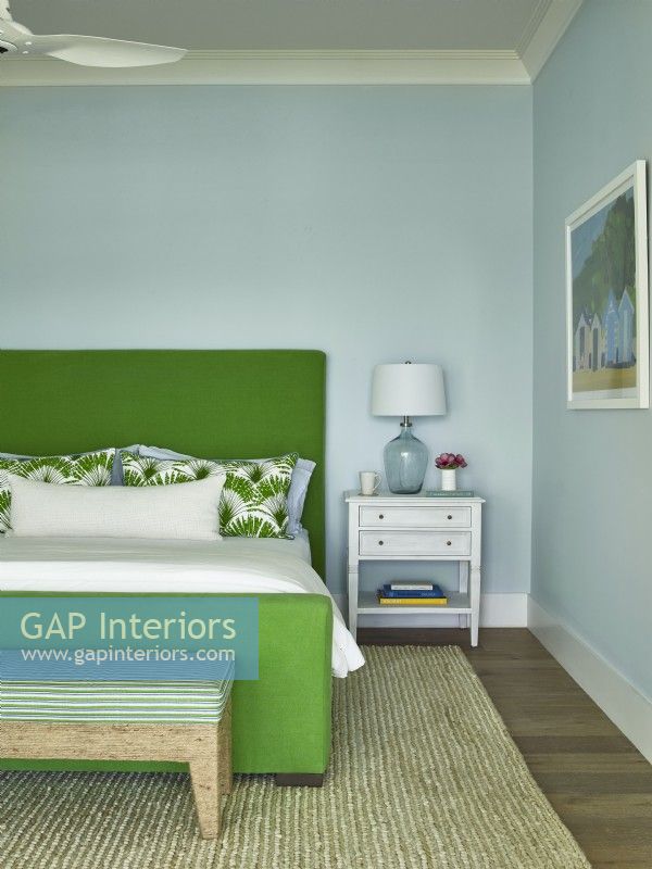 A guest bedroom in green and blue on Bakers Bay, Bahamas.