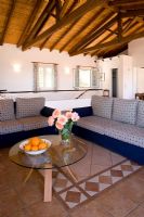 Villa Christina, Kaminaki, Corfu, Greece  Open plan living room with sofas and coffee table
