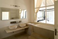 corfu, greece. villa kalokairi near kalamaki. modern bathroom with view to bedroom