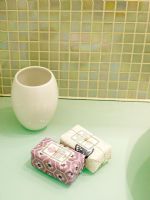 Detail of toothbrush holder and bars of soap