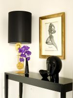 Dark wood console table with lamp