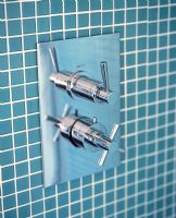 Detail of modern wall mounted shower fittings 