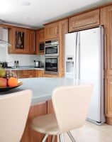 Modern kitchen diner with large American style fridge freezer
