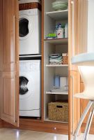 Concealed washing machine and tumble dryer in kitchen cupboards